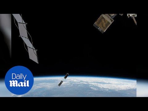 Stunning footage shows Space Station launch mini satellites - Daily Mail